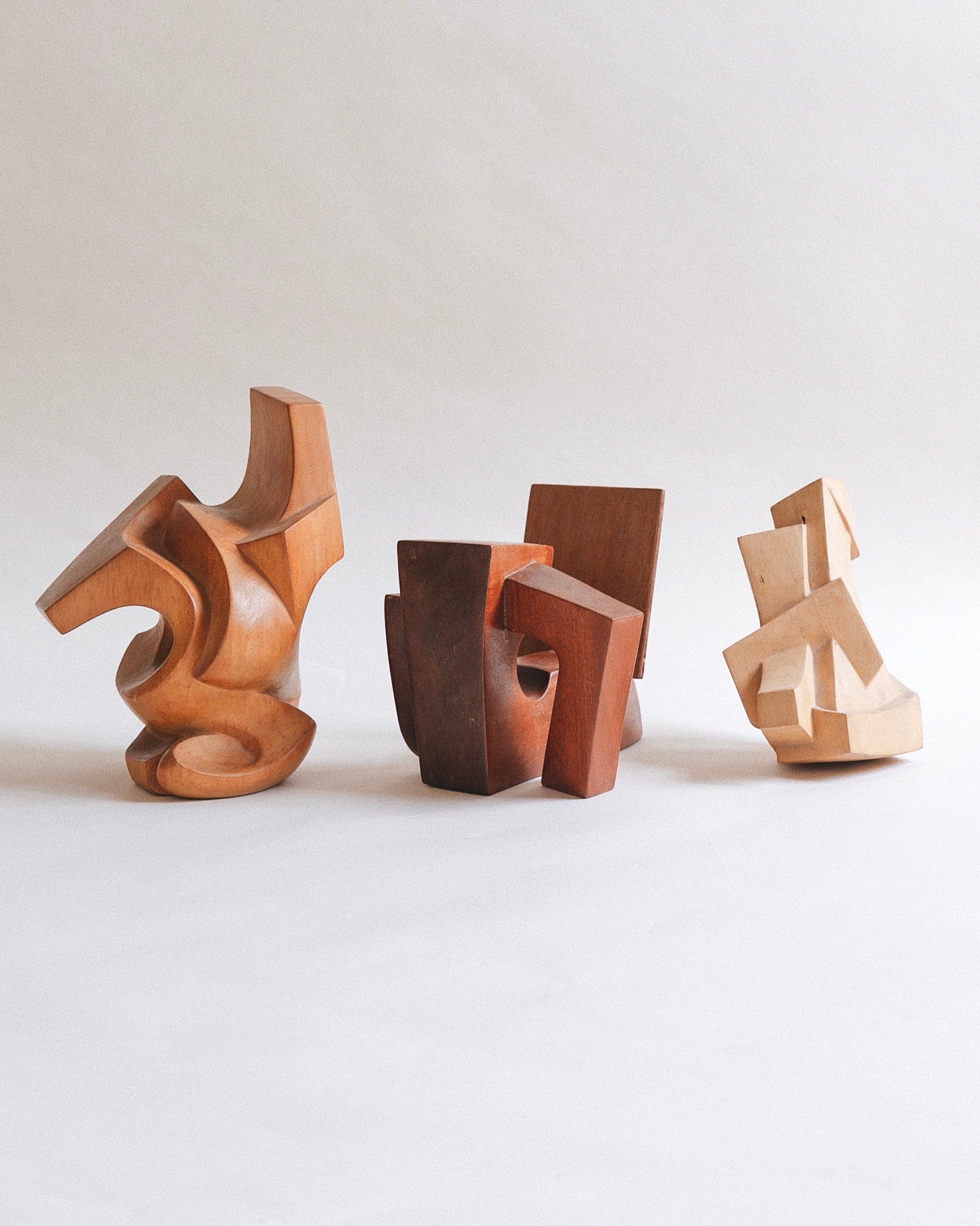 Trio Of Carved Geometric Sculptures