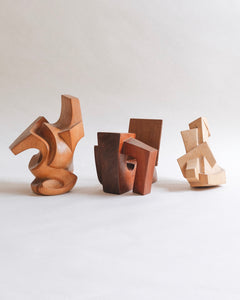 Trio Of Carved Geometric Sculptures